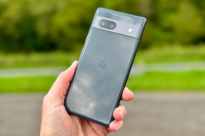 Google Pixel 7a in a person's hand.